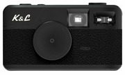 Zwarte K&L Retro Camera in een lichte studio-opstelling.